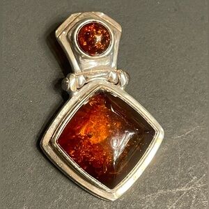 Elegant Sterling Silver and Amber Pendant
